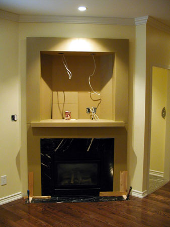 WFHDL06a - W.F. Heartwell Architect - New Fireplace Surround Being Installed